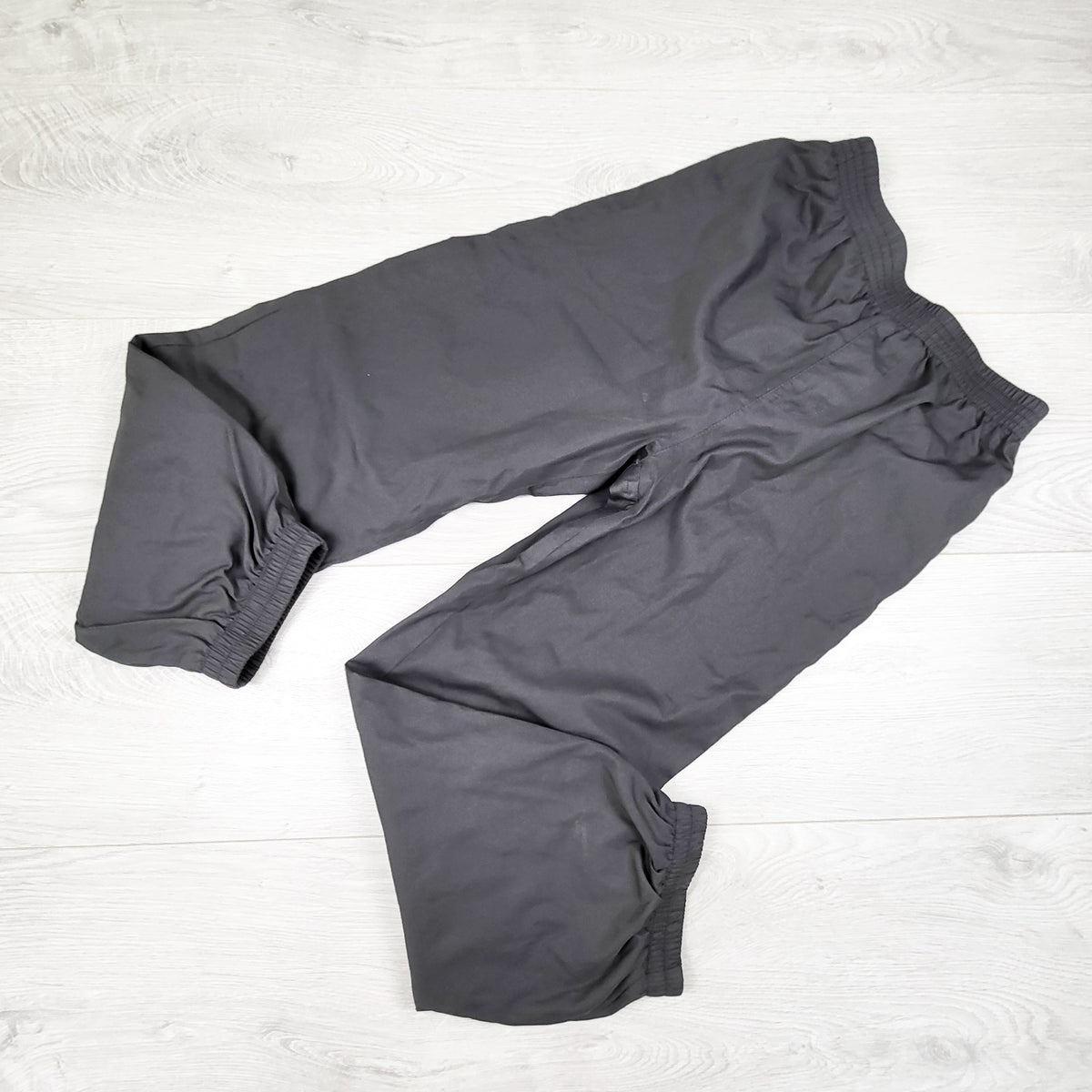 Grey jersey lined rain pants. Size 6/6X