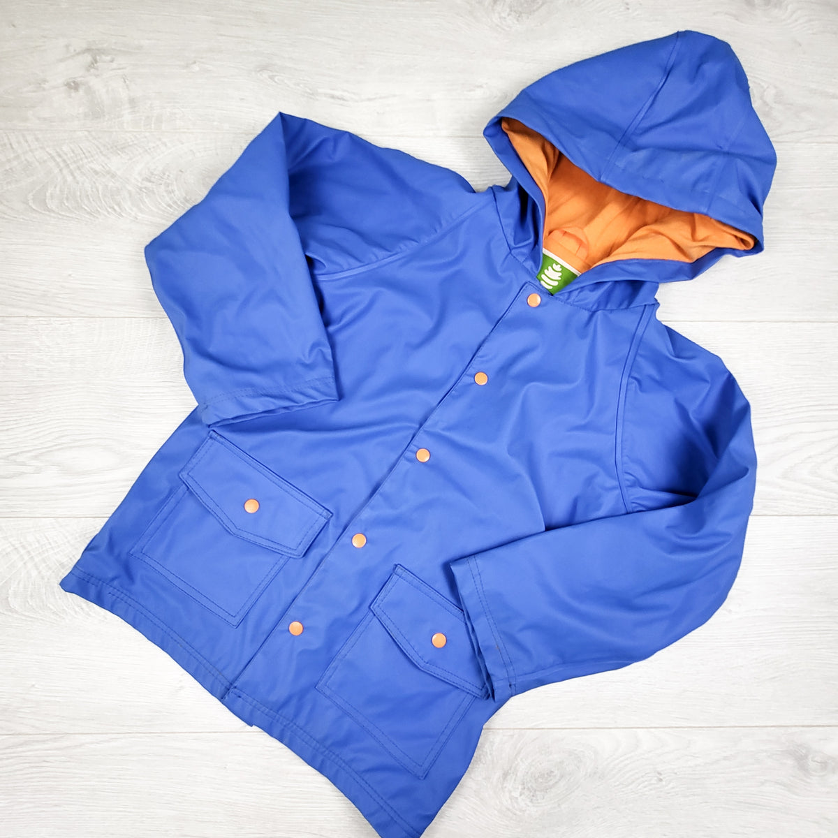 OAKI blue jersey lined rain jacket. Size 5T