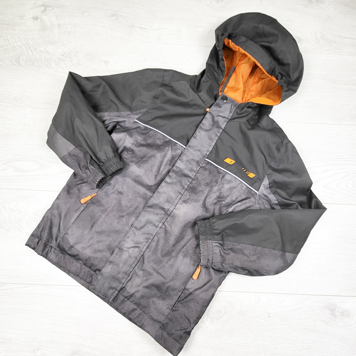 XMTN grey fleece lined rain jacket. Size 6/6X