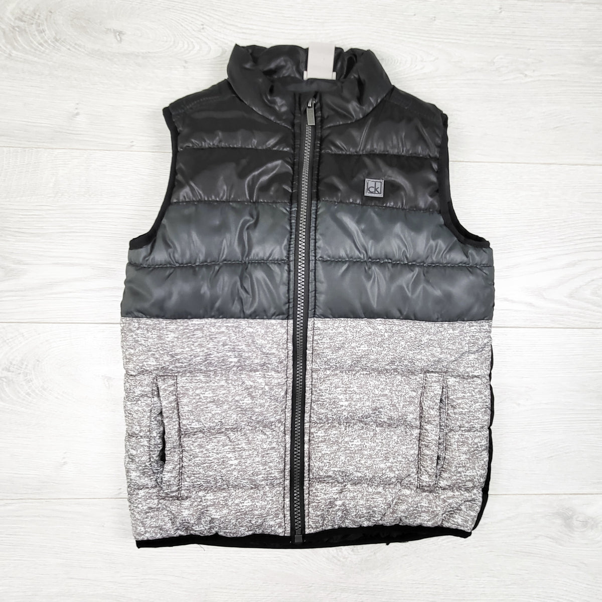 Calvin Klein striped puffer vest. Size 6