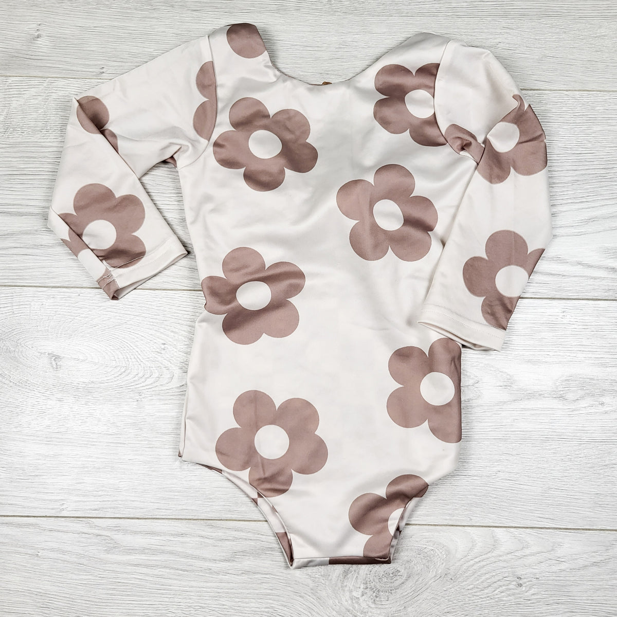 Floral print reversible one piece swimsuit. Size 5T
