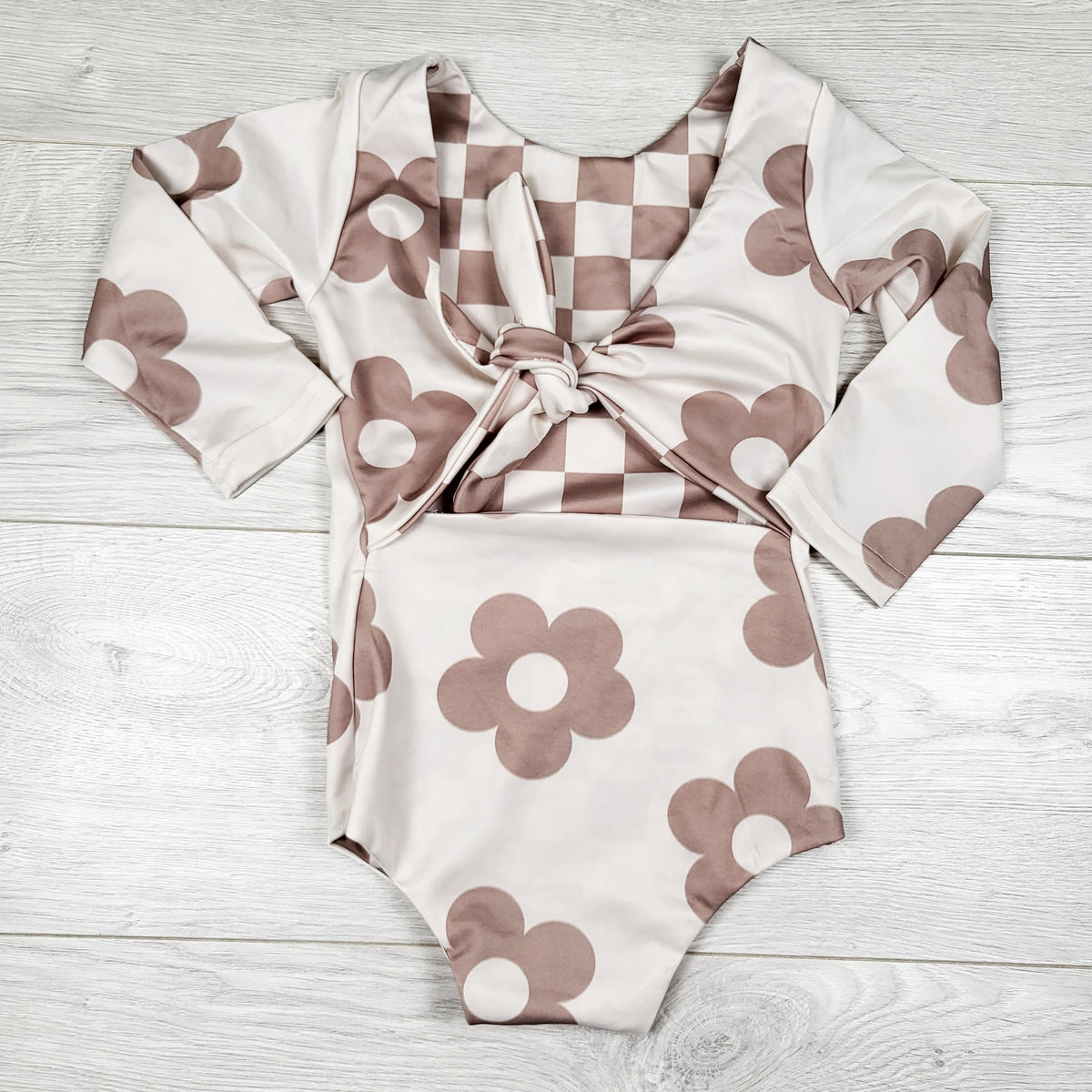 Floral print reversible one piece swimsuit. Size 5T