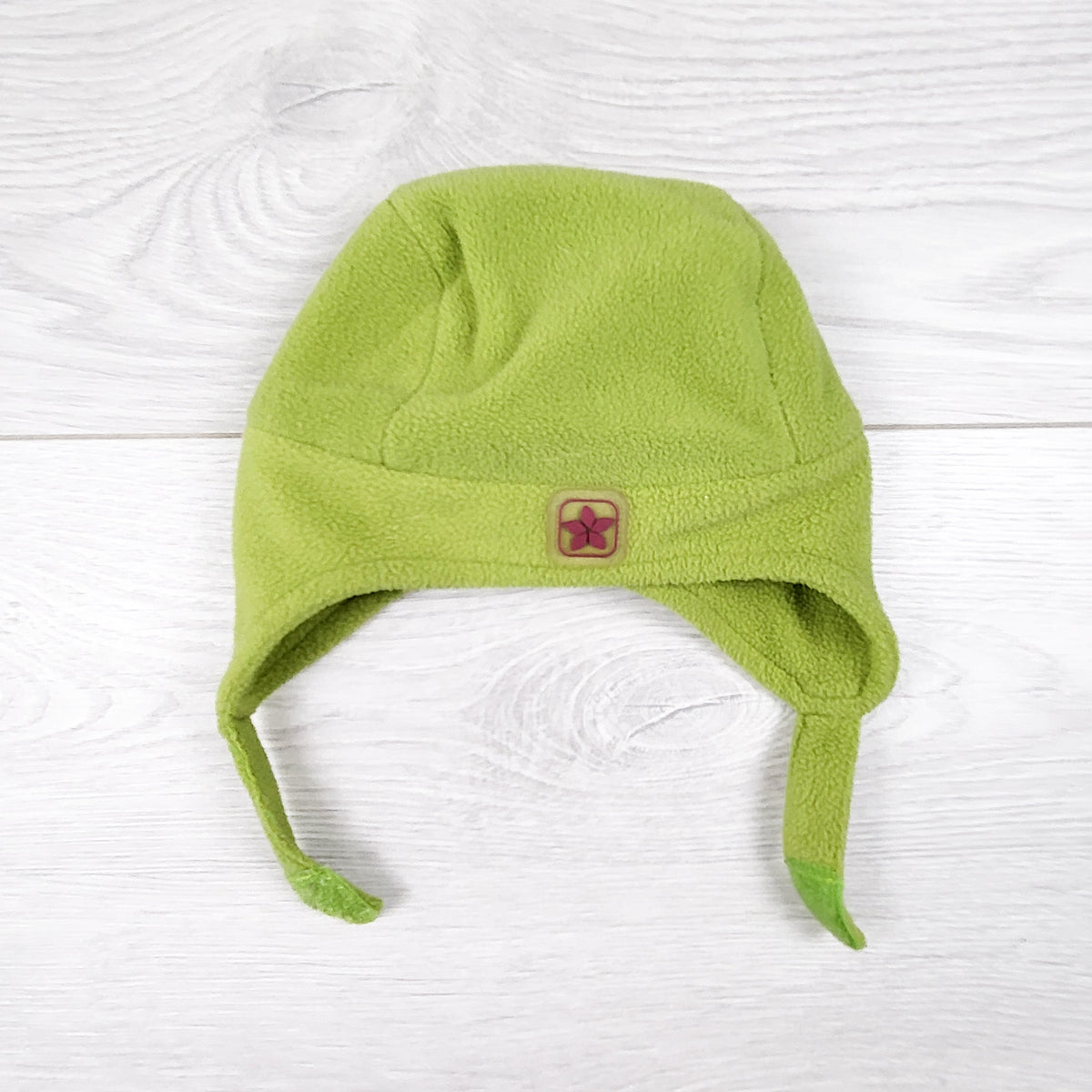 Calikids green fleece hat. Newborn size