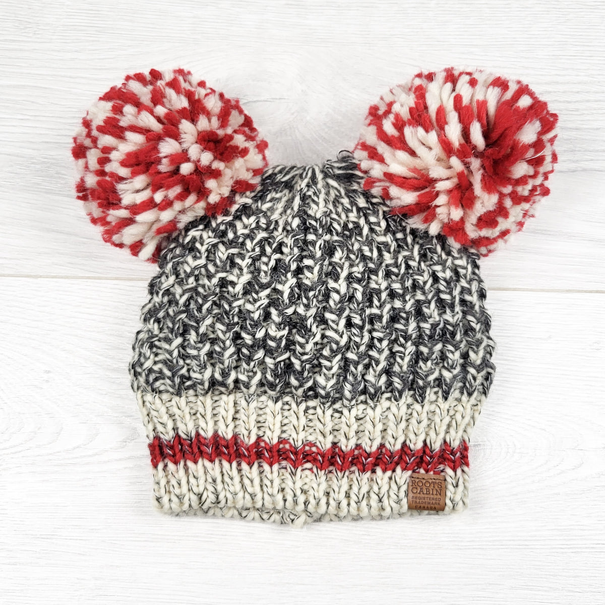 Roots Kids fleece lined knit double pom pom toque. Size 12-24 months