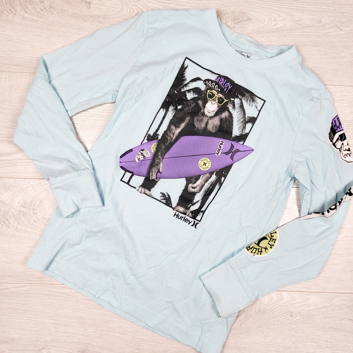 Hurley light blue long sleeve top with surfing ape - Size 10/12