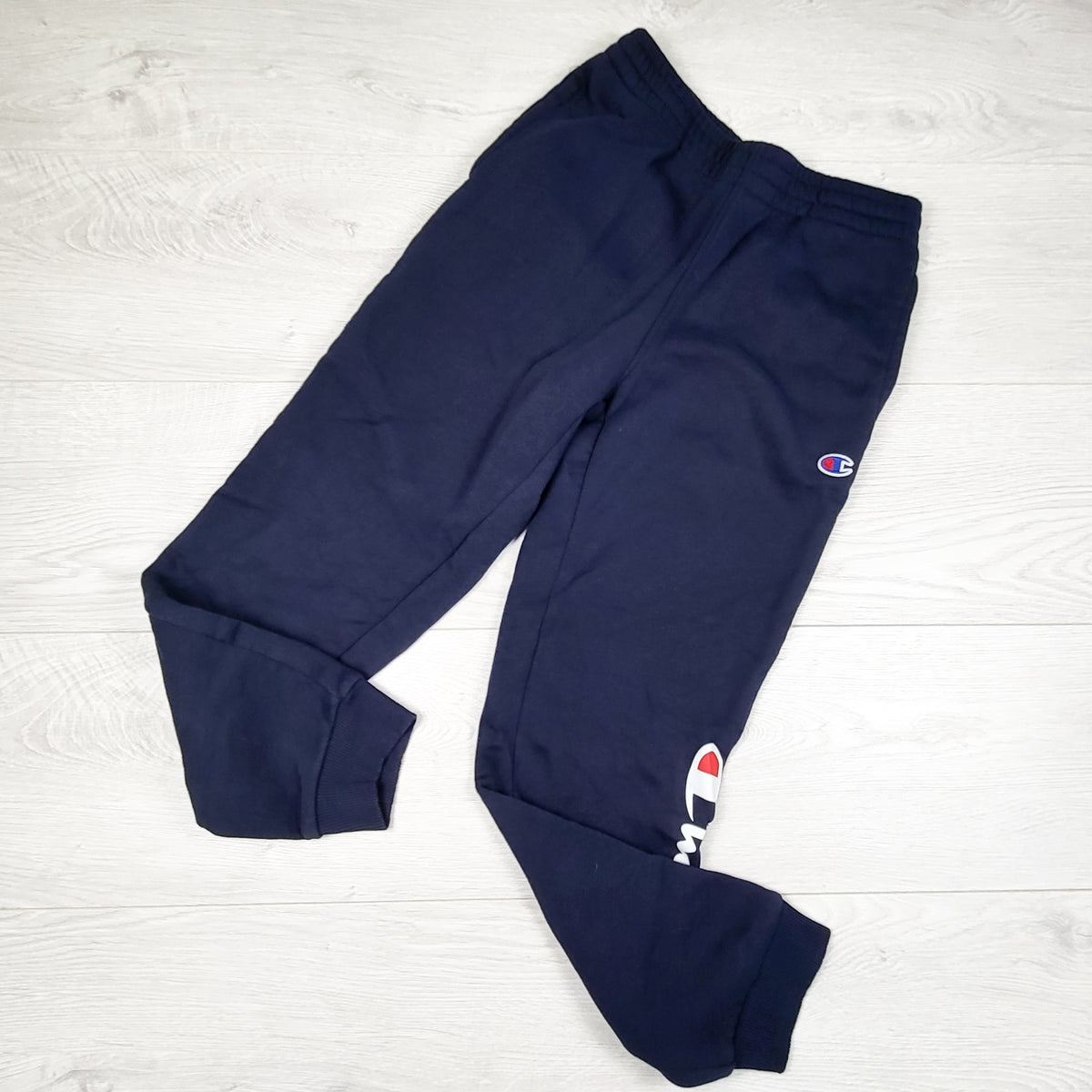 Champion navy fleecy lined joggers - Size medium