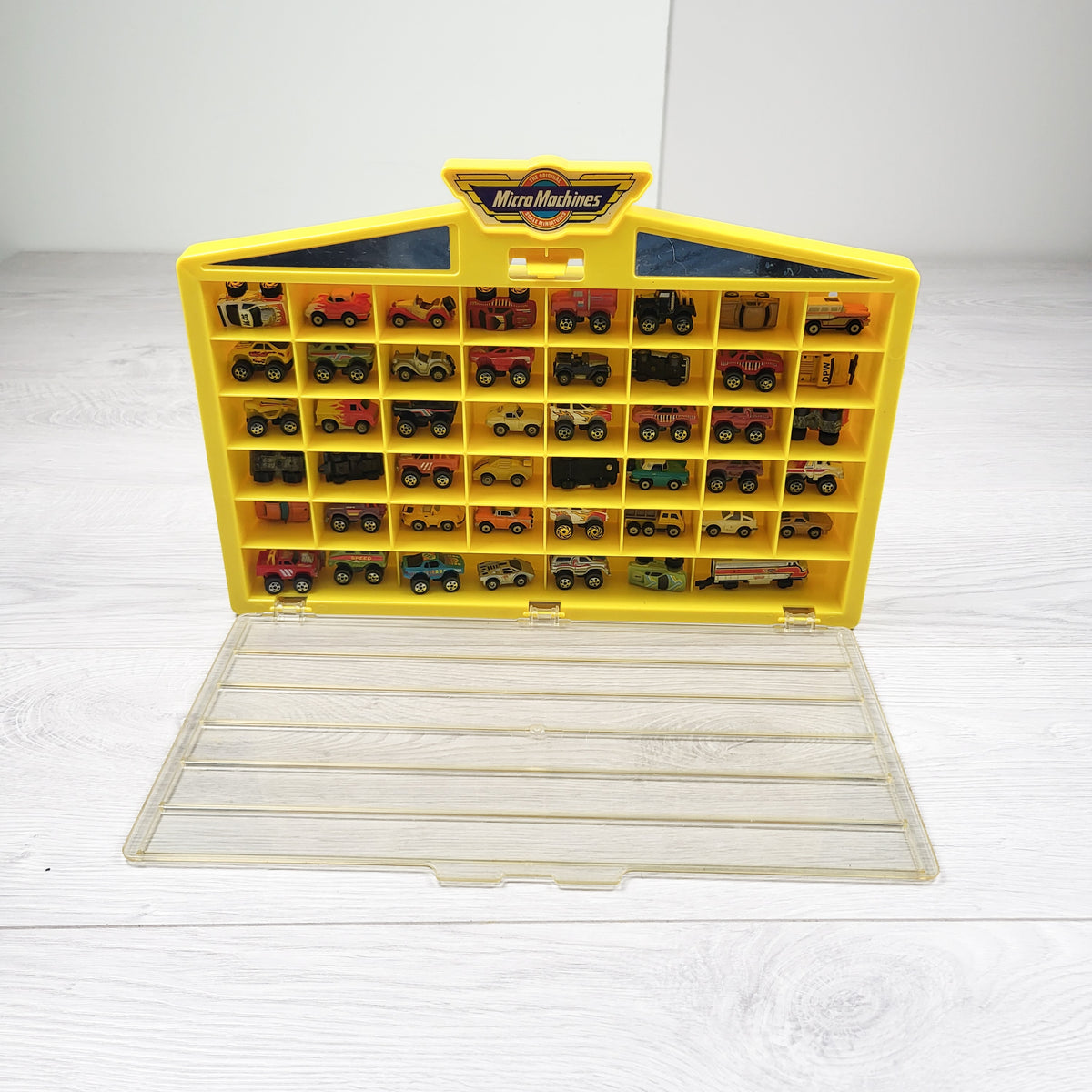 Vintage Micro Machines Galoob 48-Car Yellow Display Case Set with 47 vehicles (Lot 1)