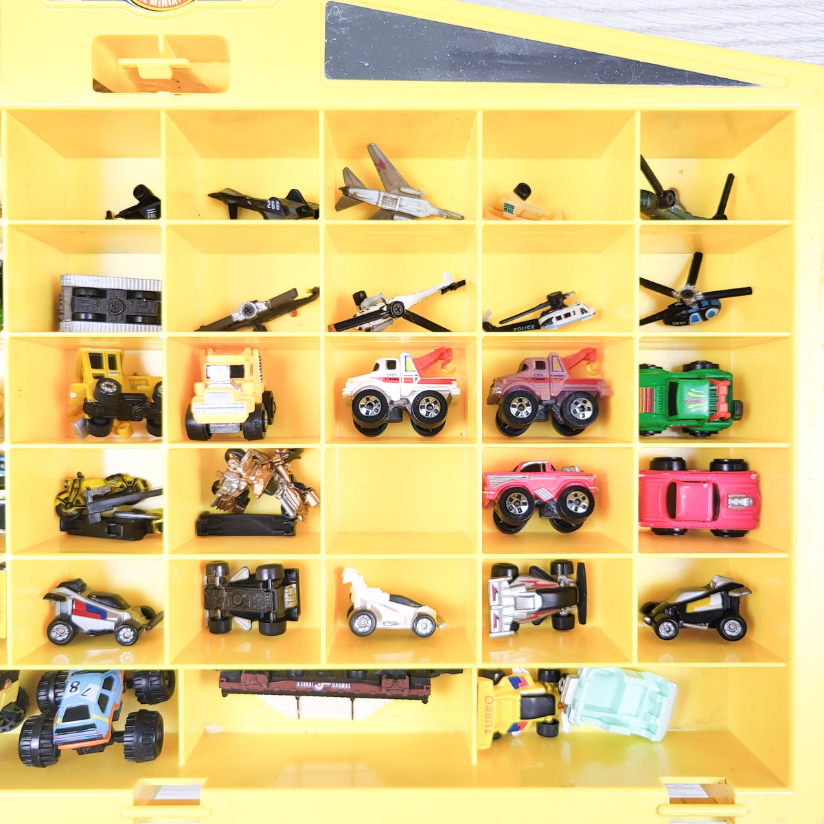 Vintage Micro Machines Galoob 48-Car Yellow Display Case Set with 42 vehicles - Lot #2