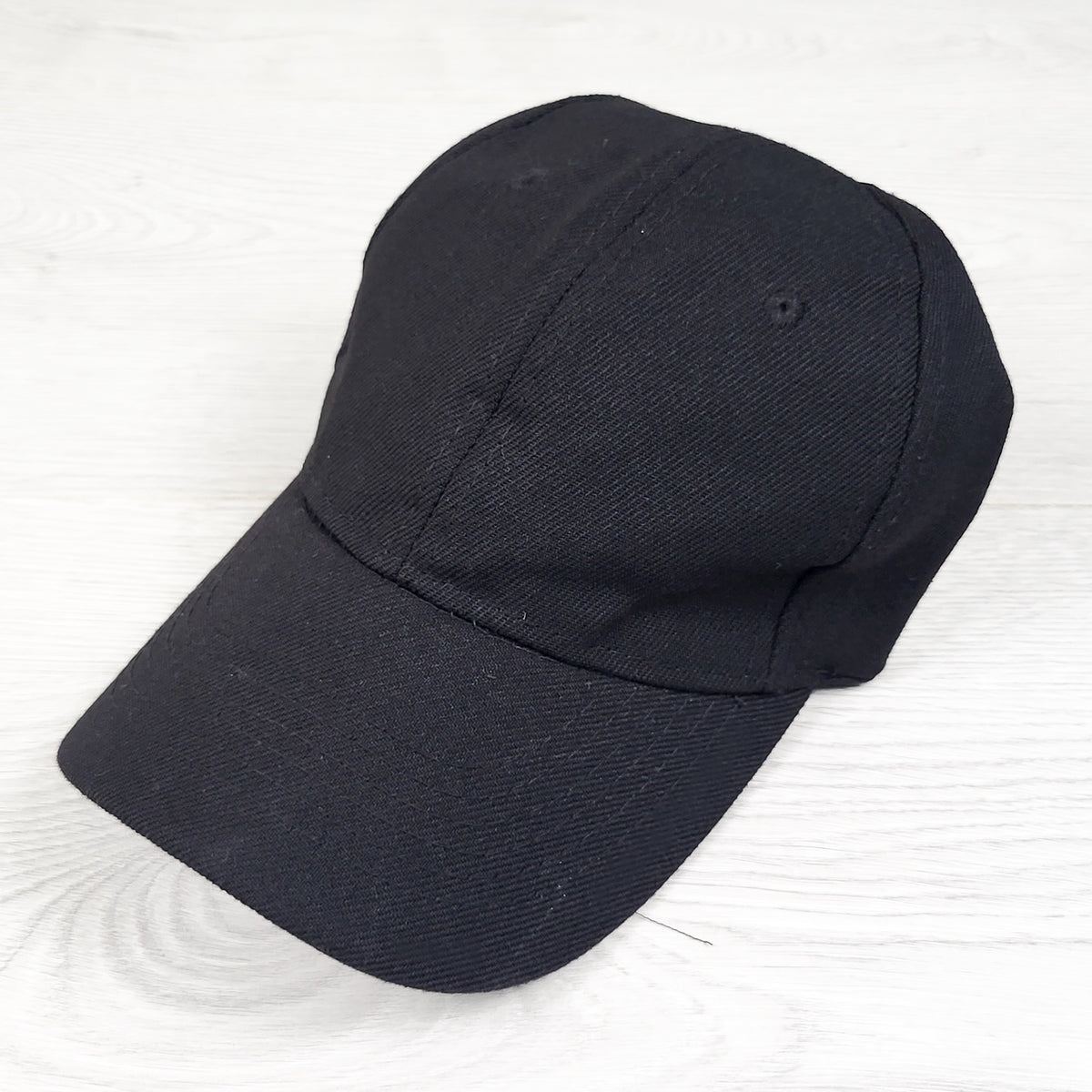 Black adjustable cap - approx 2-5 Years