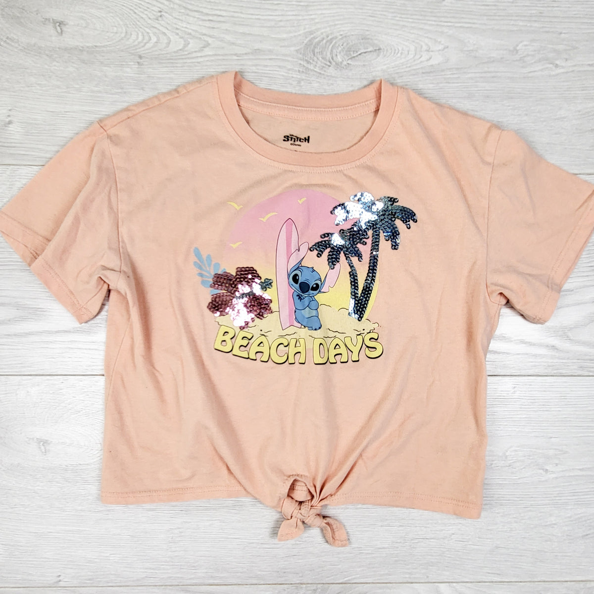 Peach coloured Lilo and Stitch t-shirt - Size 8