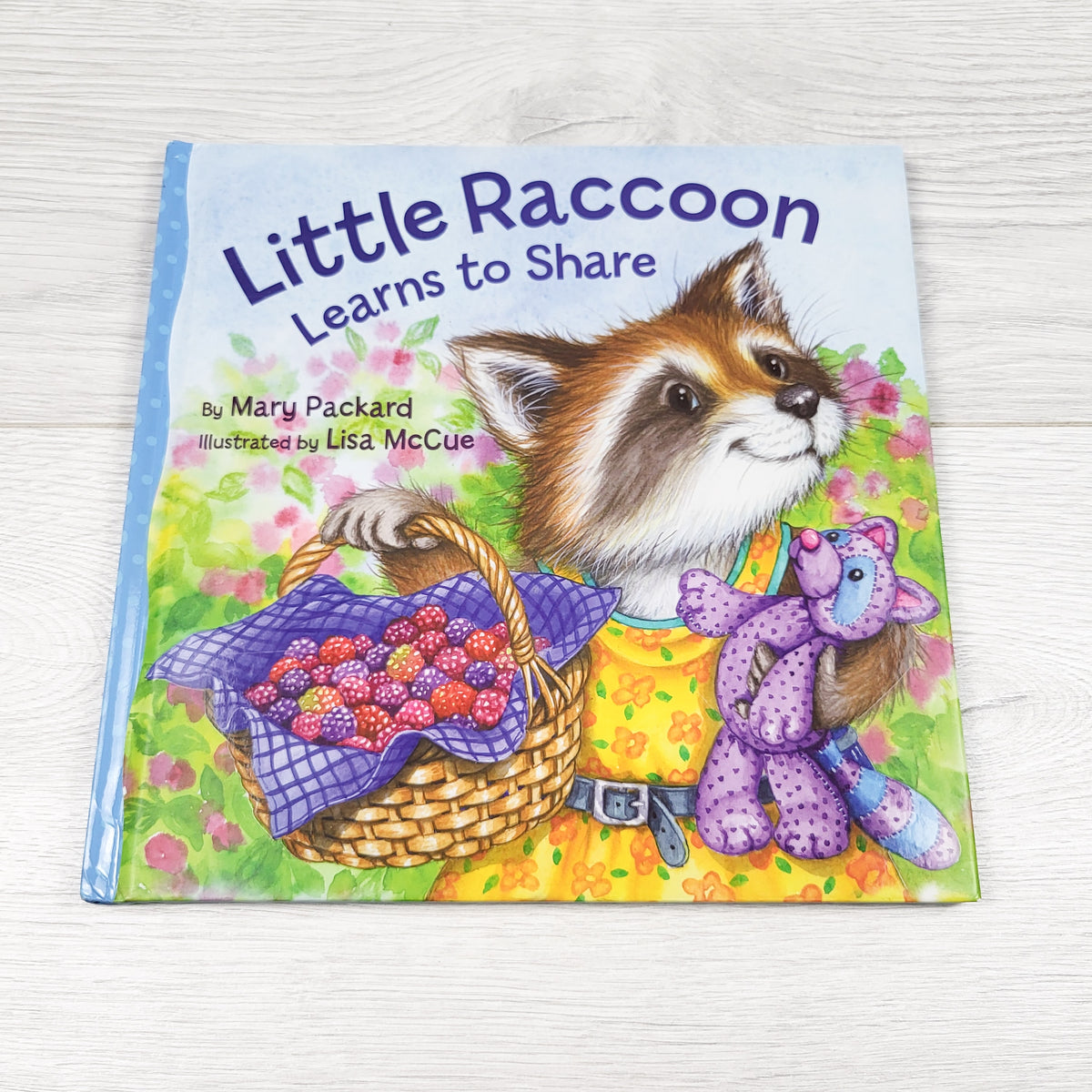 Little Racoon Learns to Share - hardcover book