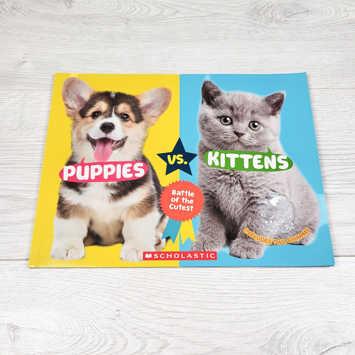 Puppies Vs. Kittens - soft cover book