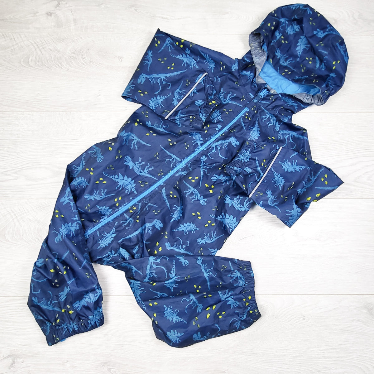Mountain Warehouse navy dinosaur print single layer one piece rain suit - Size 24 to 36 months