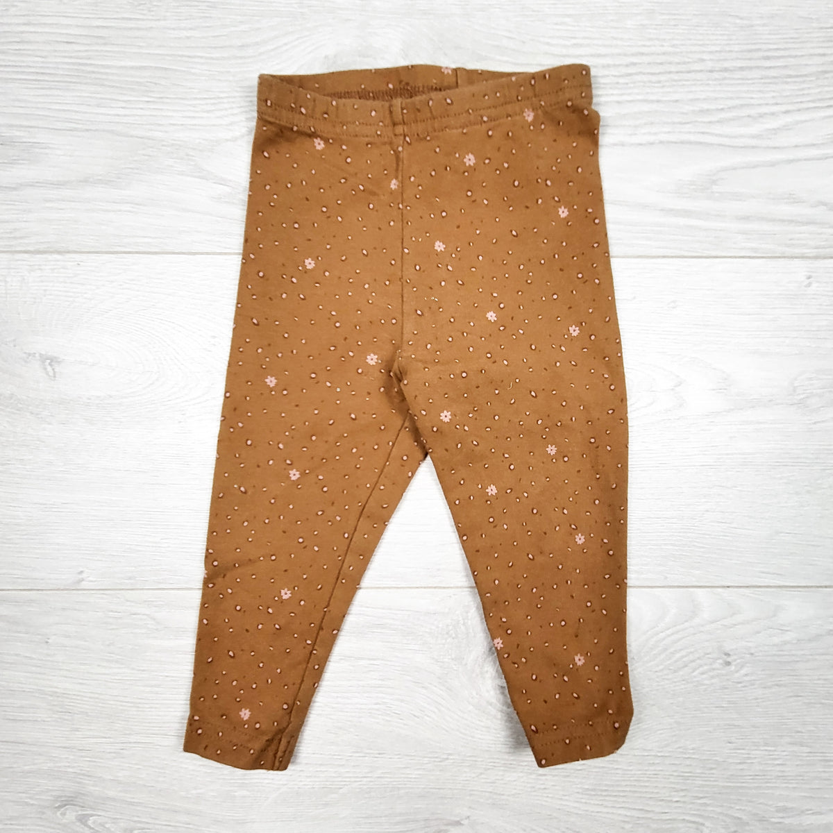Oshkosh tan leggings with flowers - Size 12 months