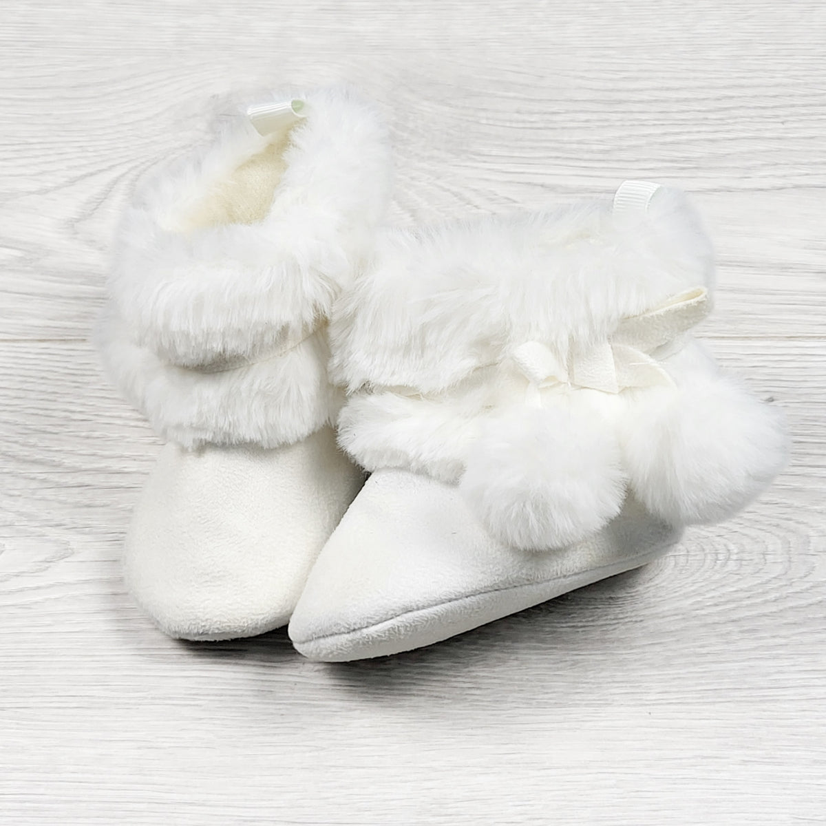 First Steps white pom pom booties - Size 3 to 6 months - AS IS