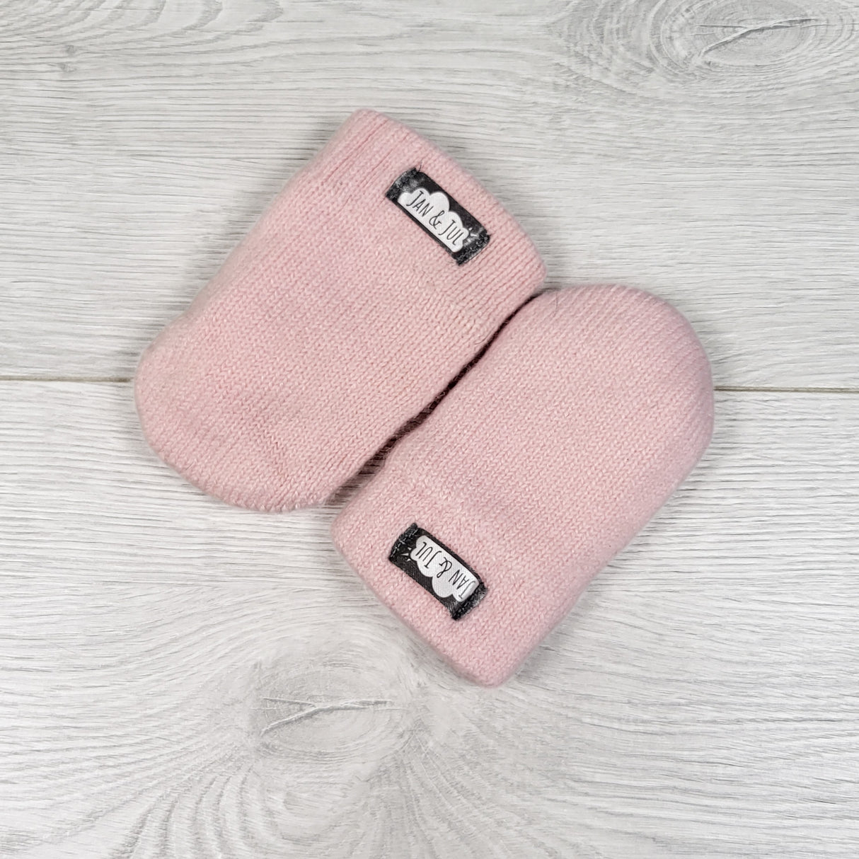 Jan and Jul pink fleece lined mittens. Size small (3-9 months)