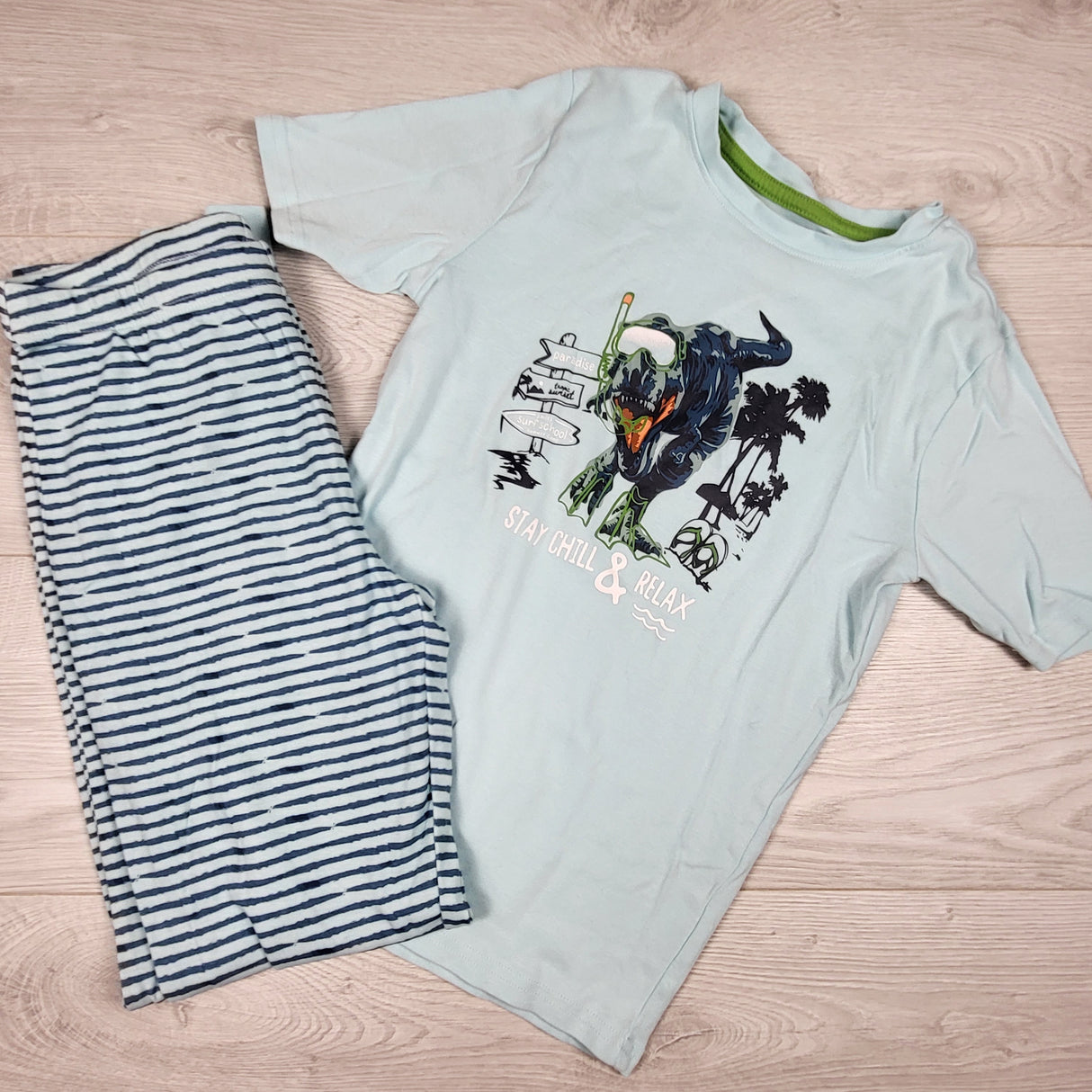 George light blue 2pc T-Rex PJs. Size 10/12