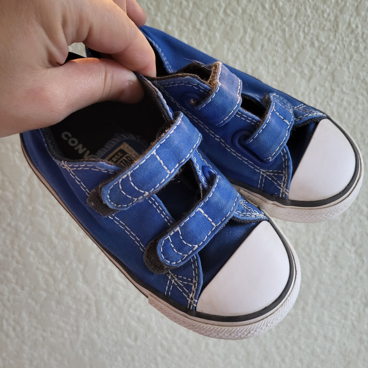 Blue Converse low top shoes. Size 8