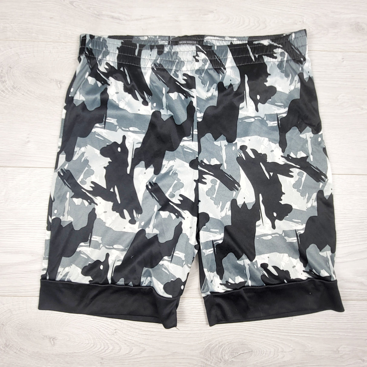 07 Athletic camouflage active shorts. Size 8-10 Years