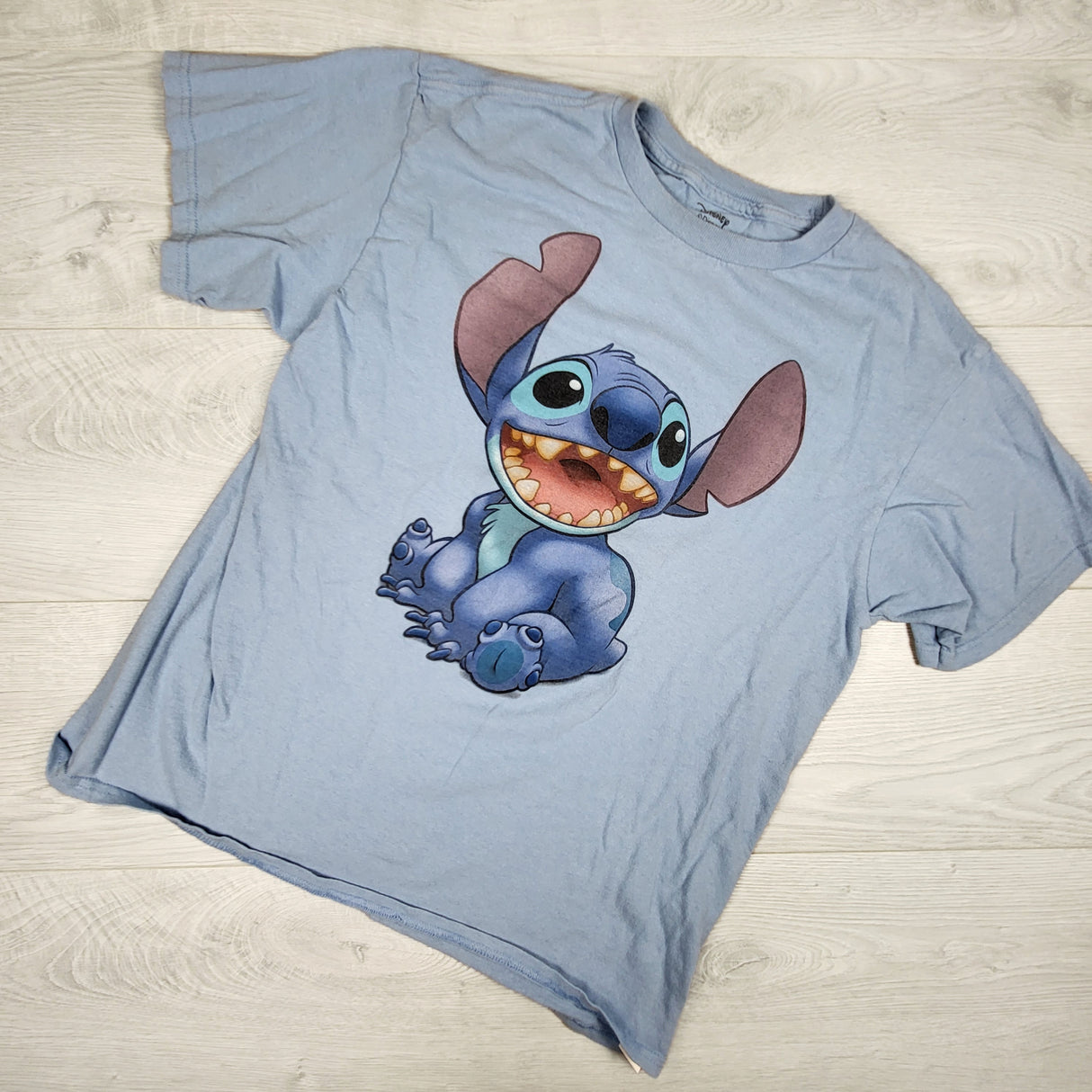 Disney blue cotton Stich t-shirt. Size large (10/12)