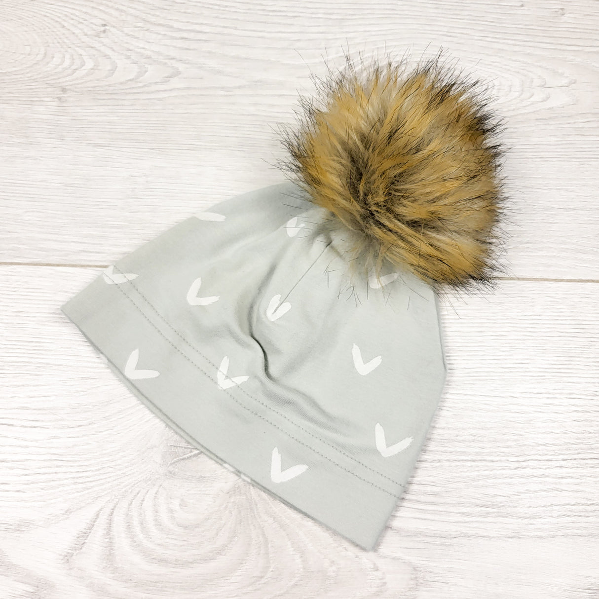 Little and Lively pom pom beanie. Infant sized